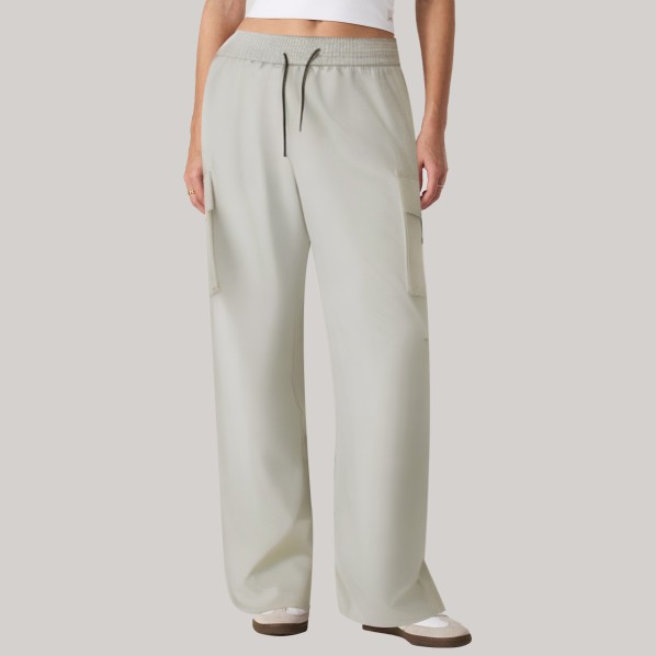 White loose-fitting women's windproof athletic pants