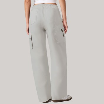 White loose-fitting women's windproof athletic pants